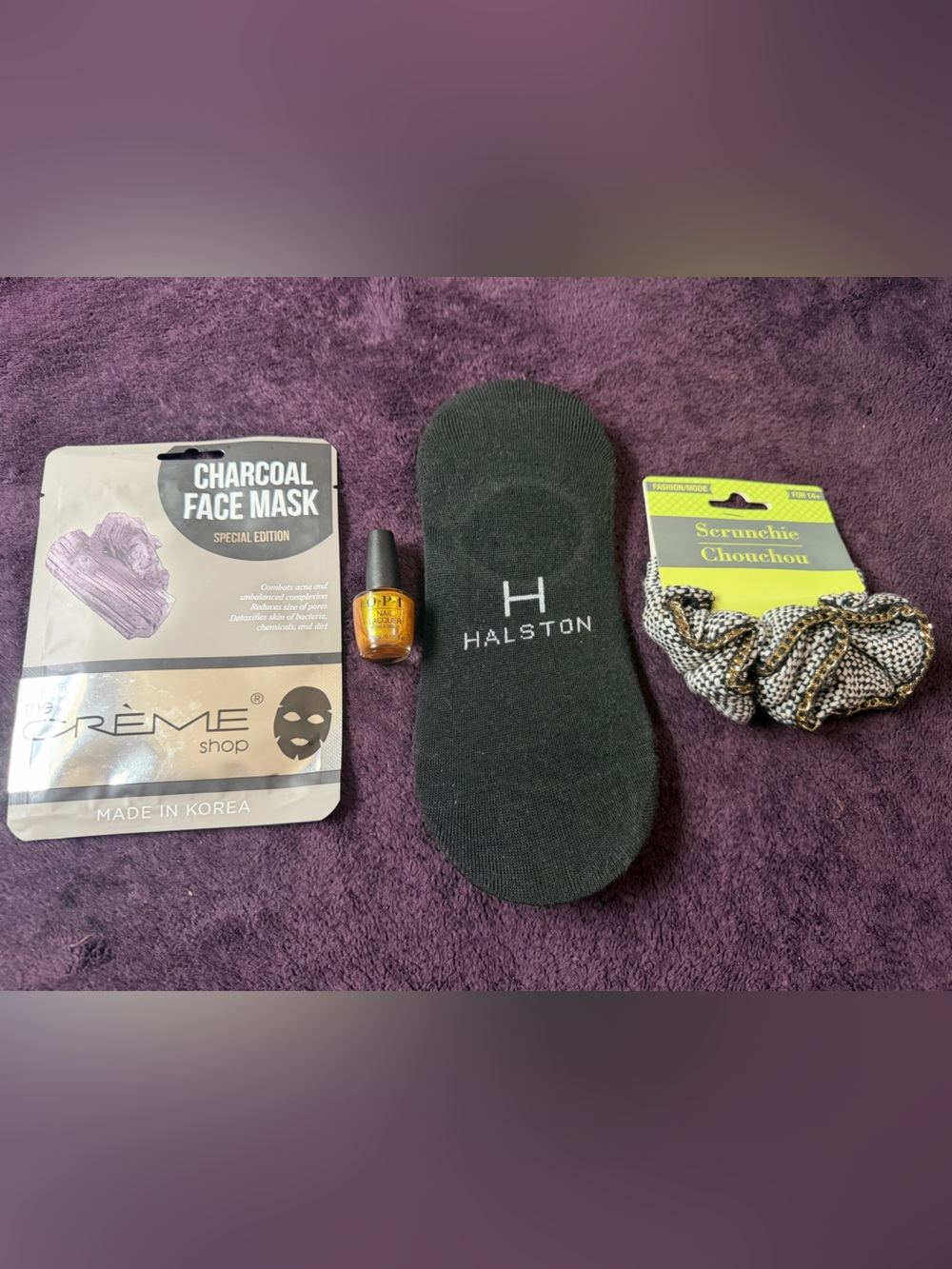 Halston Heritage Black No-Show Socks, Gold Opi nailpolish, Charcoal Face Mask